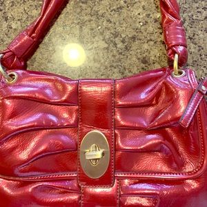Bright red shiny purse